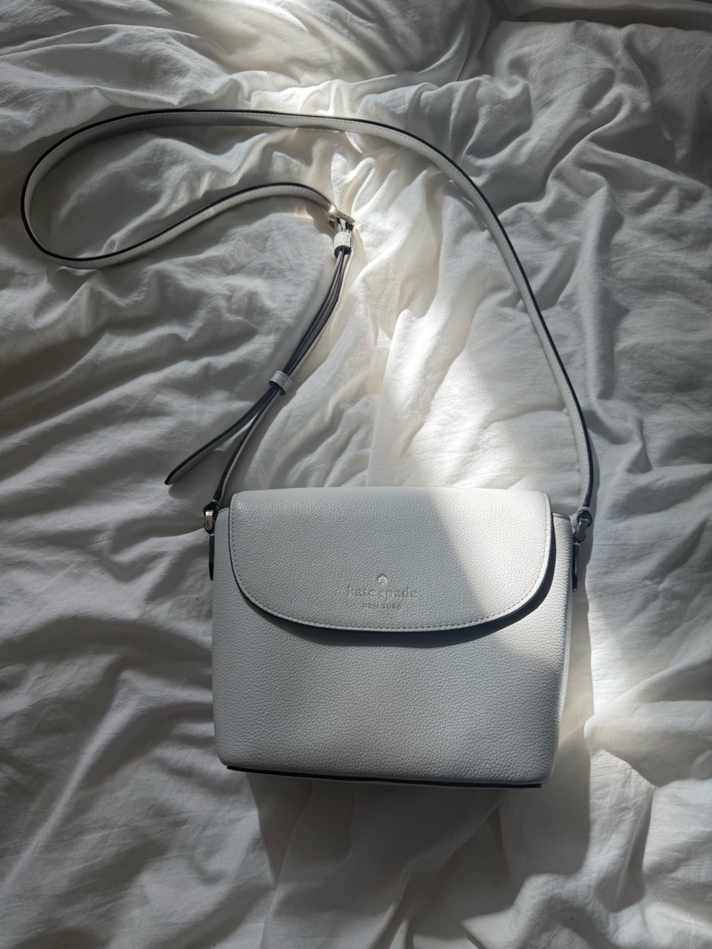 kate spade White Pebbled Leather Flap Crossbody